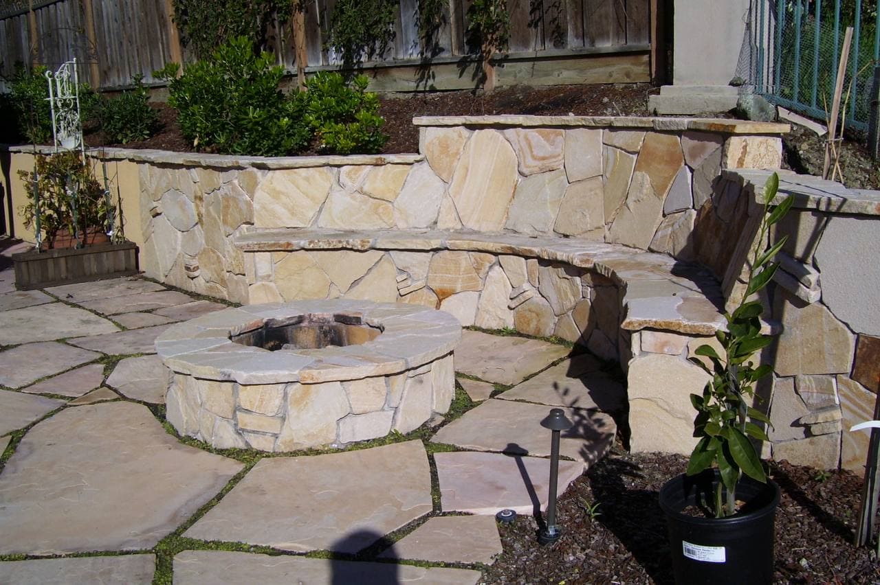 Flagstone patio with matching flagstone firepit and seat wall, Santa Cruz California